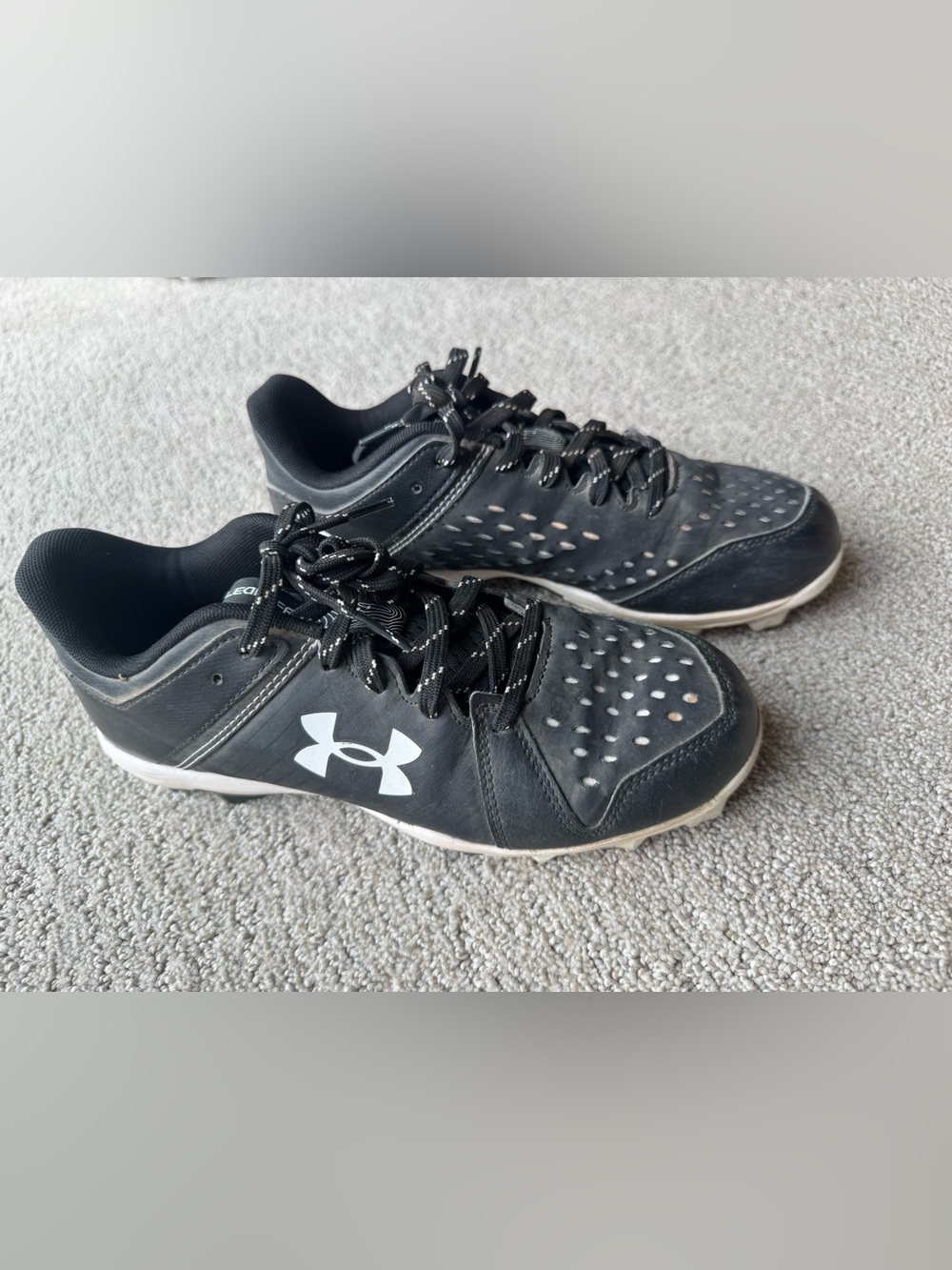Under Armour Black and White Baseball Cleat Sneakers